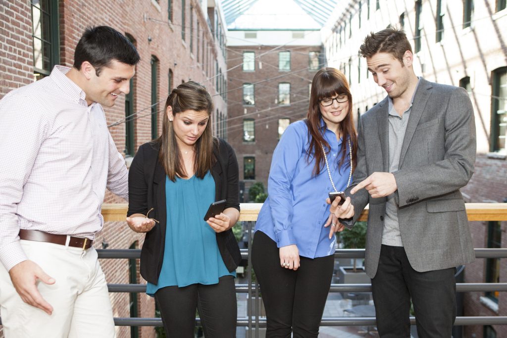 group of people on smartphones